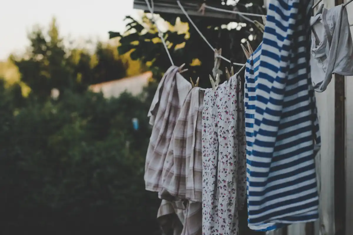 Striped and patterned clothes drying on an outdoor line