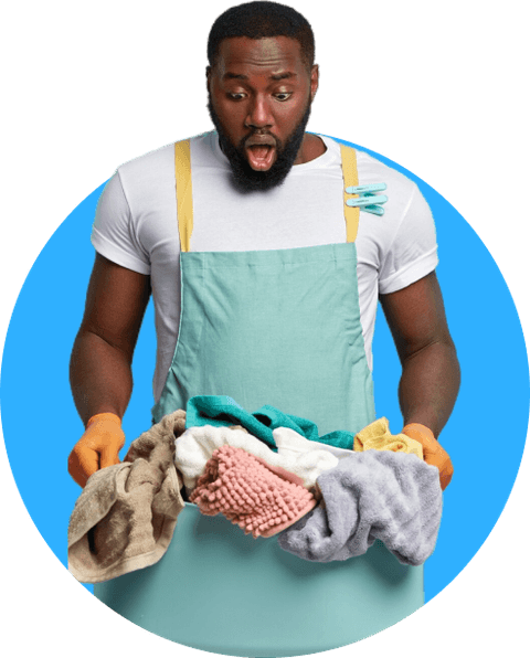 A Duffloo Washer Hero holding an armful of laundry